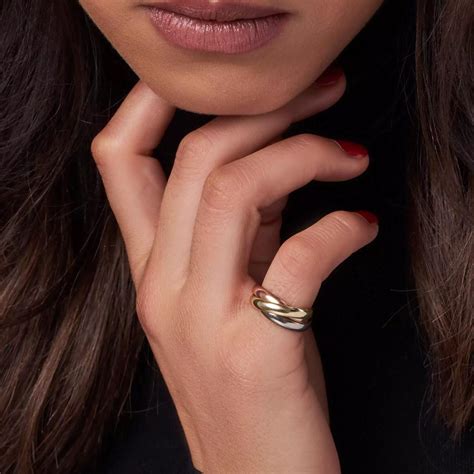 trinity cartier ring|Cartier Trinity ring on hand.